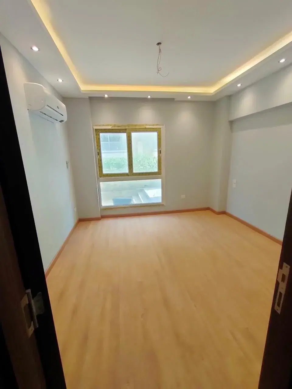 شقة أرضي ١٤٥ م² مع حديقة خاصة وإطلالة ماونتن فيو — iCity Club Park، القاهرة الجديدة