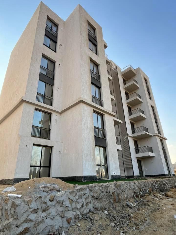 Garden Apartment for Sale in Eco West with Private Garden - Below Market Price