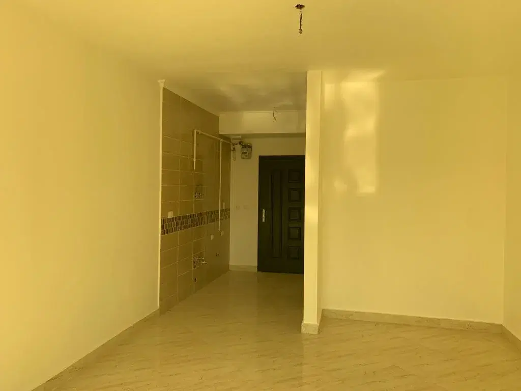 استوديو مُشَطَّب بالكامل للبيع في أروما — جاهز للسكن