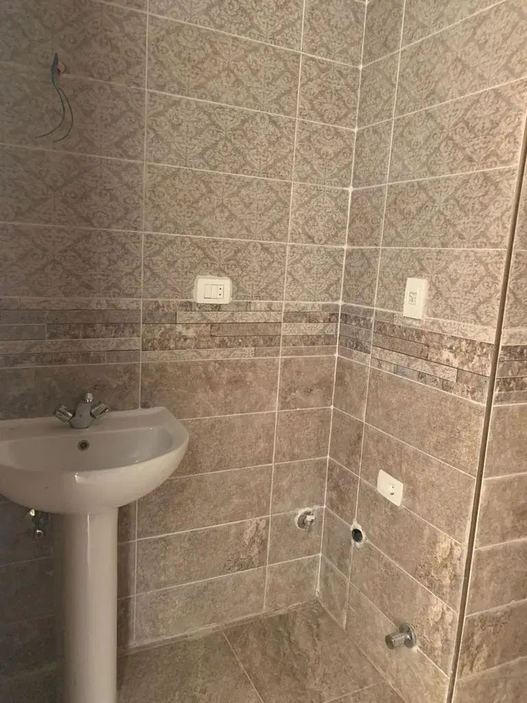 استوديو مُشَطَّب بالكامل للبيع في أروما — جاهز للسكن